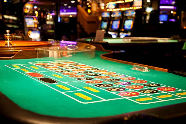 Habanero slot game interface showing reels, stake controls, and spin button